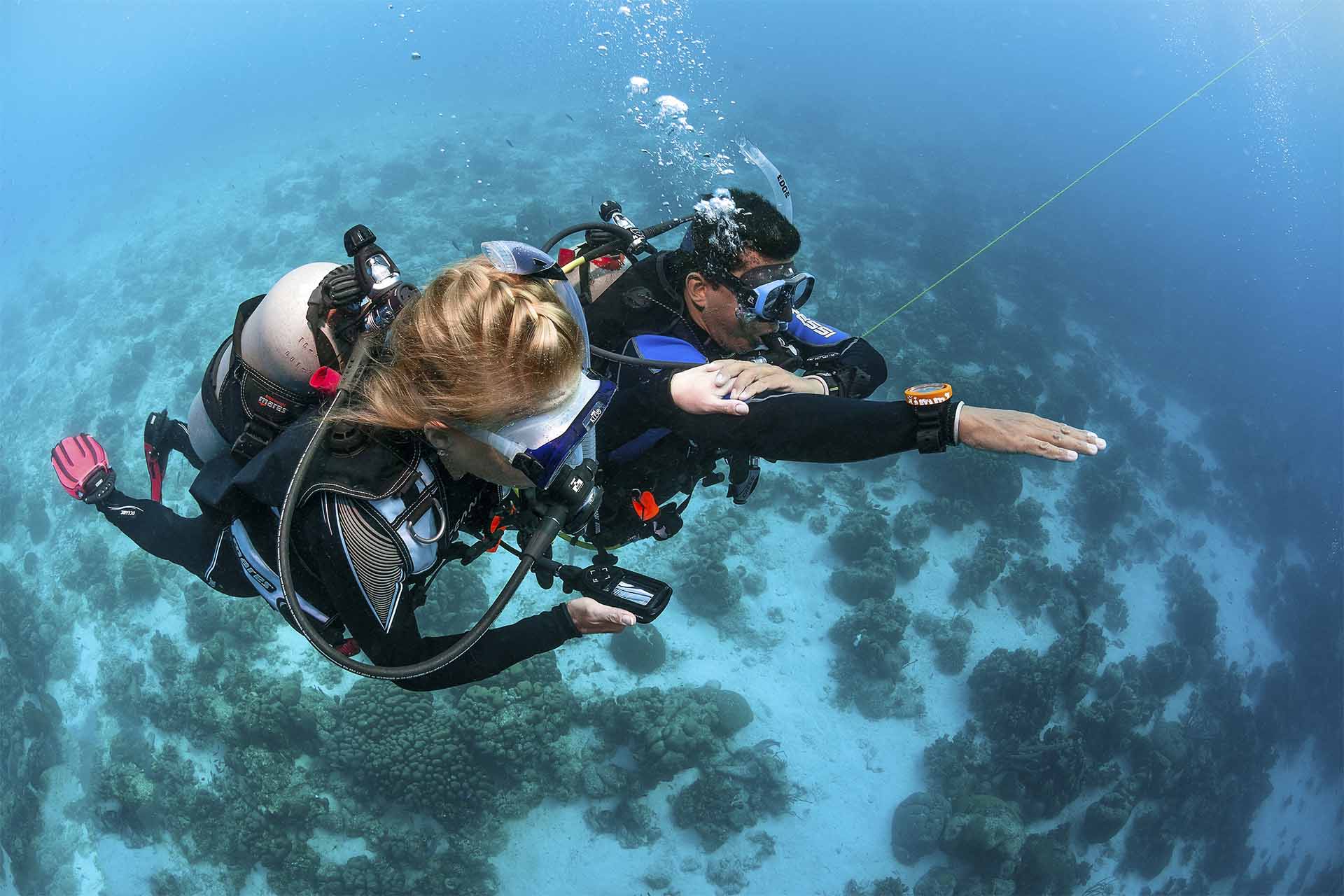 Advance open water divers practicing navigation